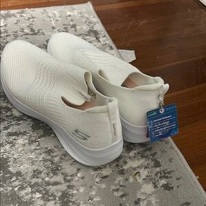 Skechers Women's White Slip-On Sneakers